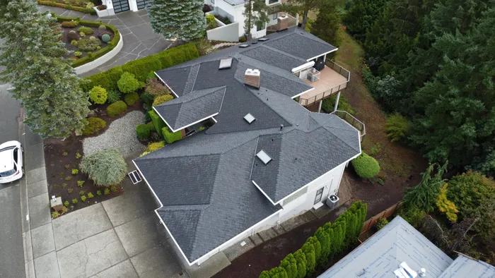 Completed shingle roof replacement on a home in Bellevue, WA