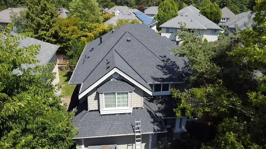 A completed architectural shingle roof on a home in Sammamish, WA